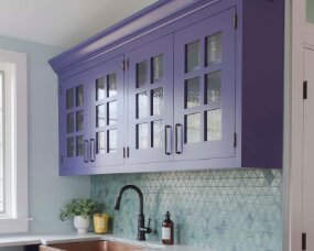 141-03 Wood: Maple; Paint Color: Fully Purple; Door Style: Bradford; Face Frame: Square Inset