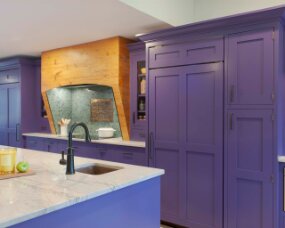 141-05 Wood: Maple; Paint Color: Fully Purple; Door Style: Bradford; Face Frame: Square Inset