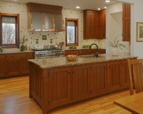 139-01 Wood : Sapele (Wood specie no longer available. Style available in other species); Stain Color : Nutmeg; Door Style : Monterey; Face Frame : Square Inset