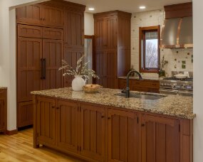 139-02 Wood : Sapele (Wood specie no longer available. Style available in other species); Stain Color : Nutmeg; Door Style : Monterey; Face Frame : Square Inset