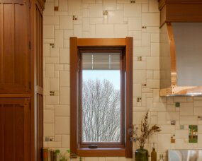 139-03 Wood : Sapele (Wood specie no longer available. Style available in other species); Stain Color : Nutmeg; Door Style : Monterey; Face Frame : Square Inset