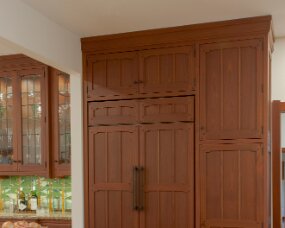 139-05 Wood : Sapele (Wood specie no longer available. Style available in other species); Stain Color : Nutmeg; Door Style : Monterey; Face Frame : Square Inset