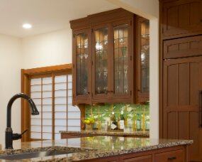 139-06 Wood : Sapele (Wood specie no longer available. Style available in other species); Stain Color : Nutmeg; Door Style : Monterey; Face Frame : Square Inset