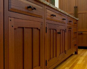 139-07 Wood : Sapele (Wood specie no longer available. Style available in other species); Stain Color : Nutmeg; Door Style : Monterey; Face Frame : Square Inset