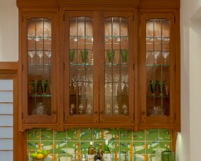 139-08 Wood : Sapele (Wood specie no longer available. Style available in other species); Stain Color : Nutmeg; Door Style : Monterey; Face Frame : Square Inset