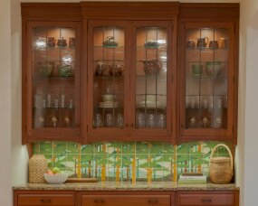 139-10 Wood : Sapele (Wood specie no longer available. Style available in other species); Stain Color : Nutmeg; Door Style : Monterey; Face Frame : Square Inset