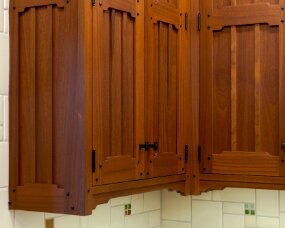 139-11 Wood : Sapele (Wood specie no longer available. Style available in other species); Stain Color : Nutmeg; Door Style : Monterey; Face Frame : Square Inset