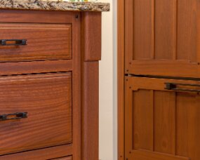 139-12 Wood : Sapele (Wood specie no longer available. Style available in other species); Stain Color : Nutmeg; Door Style : Monterey; Face Frame : Square Inset