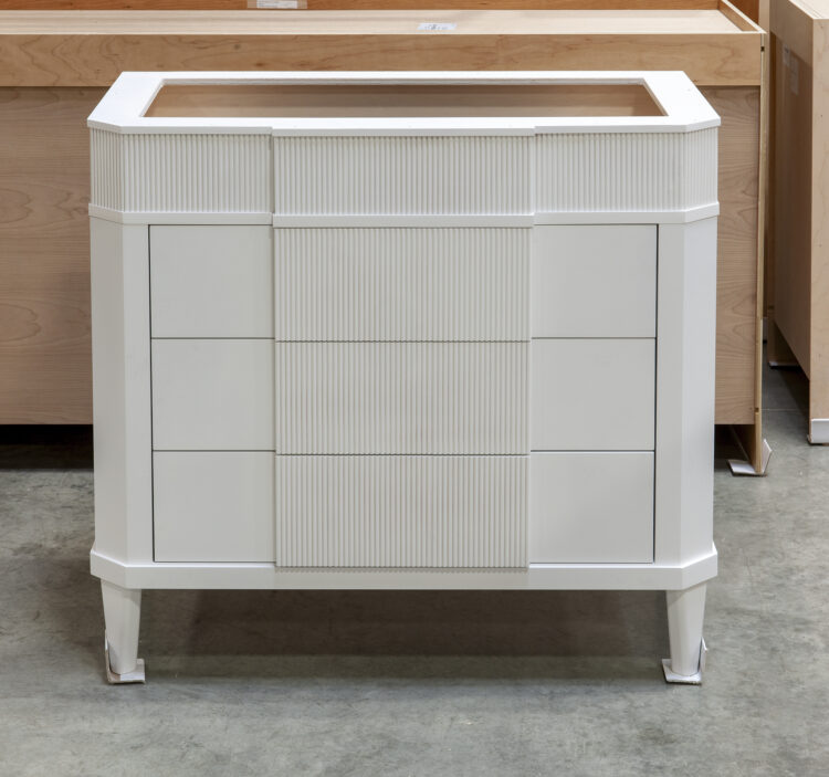 Reeded Vanity with Pipe Chase Drawers