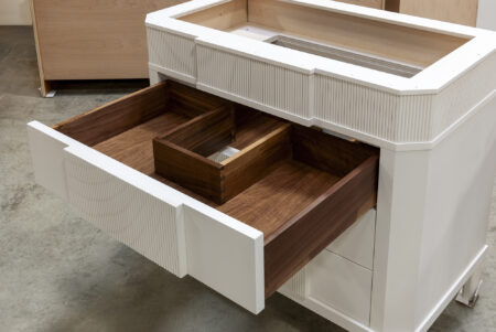 Reeded Vanity with Pipe Chase Drawers - Top Drawer Open